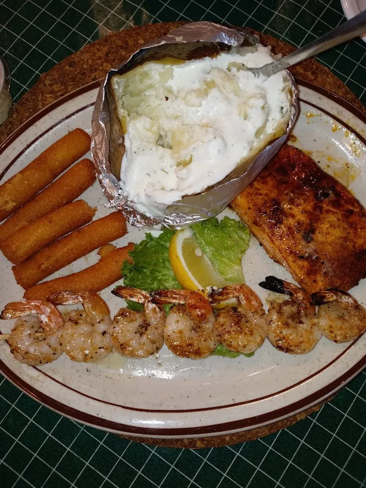 8 Oz Grilled Salmon with Grilled Shrimp Baked Potato and the Salad Bar